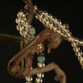 Handcrafted Thangka Pendant Inspired by Yellow Jambhala – Buddhist Wealth Guardian Iconography - Image 5