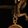The "Empowered Tara": Green Tara Round Necklace | Courage & Vitality (Red Background) - Image 3